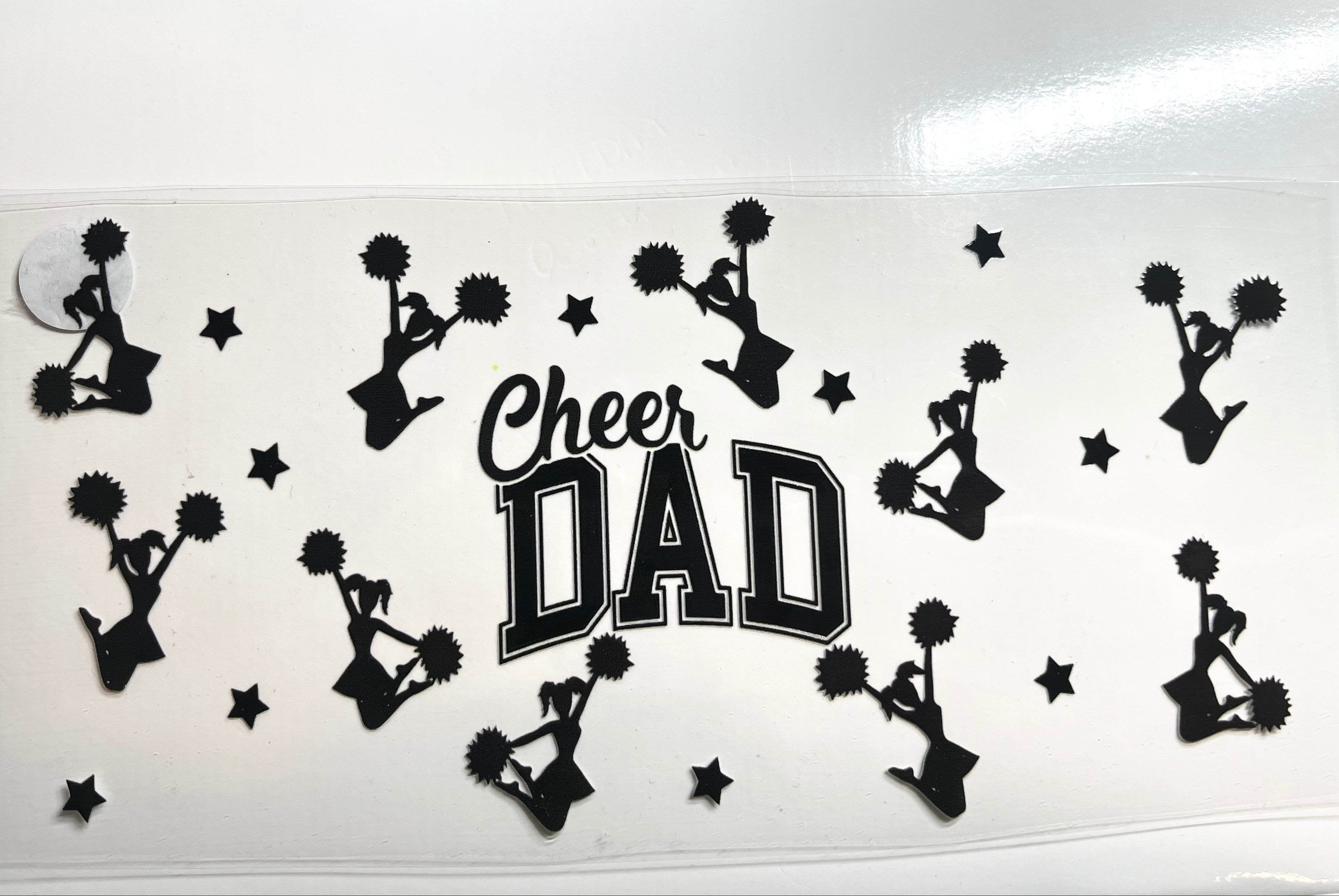 Cheer Dad decal with cheerleader silhouettes pom poms and stars in black