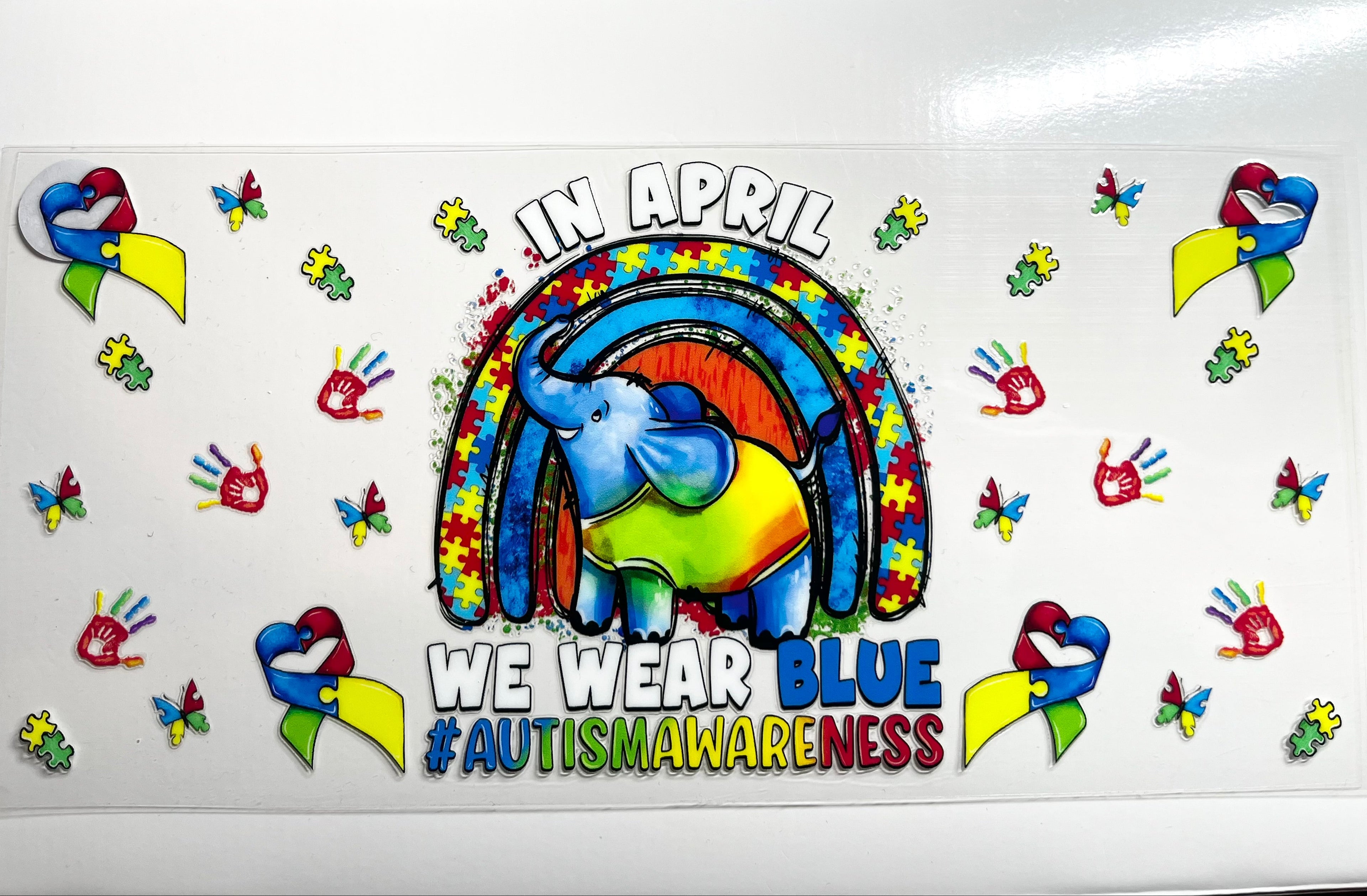In April We Wear Blue autism awareness decal with elephant rainbow and puzzle pieces
