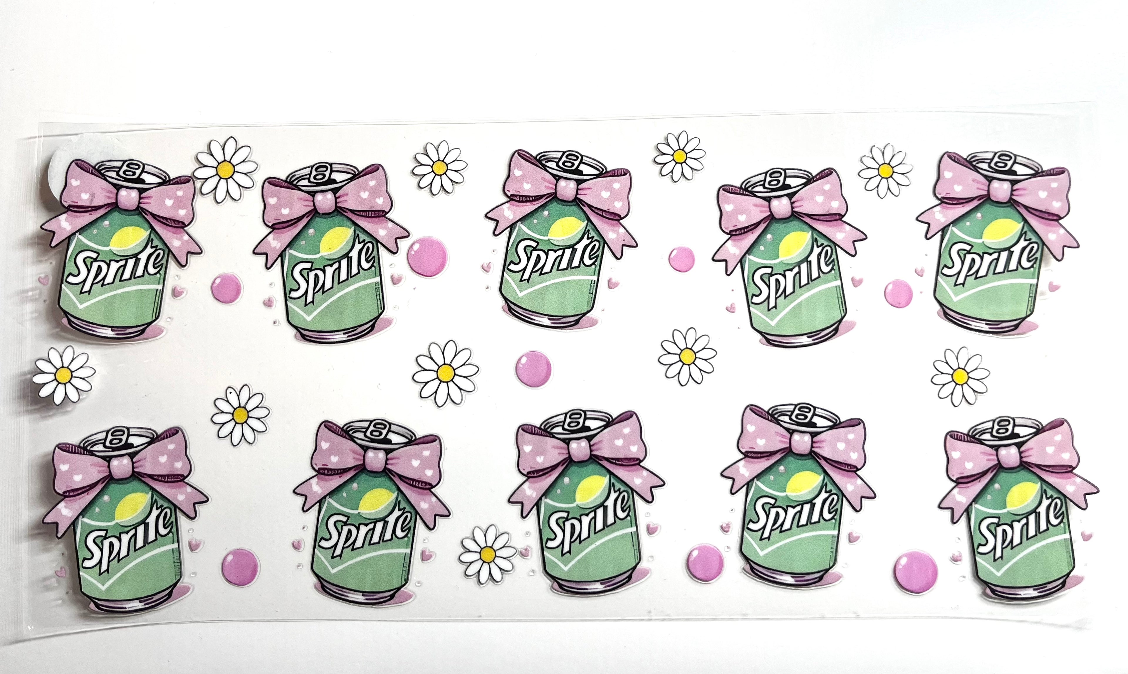 Lemon lime soda cans with lavender polka dot bows white daisies and pink bubbles decal