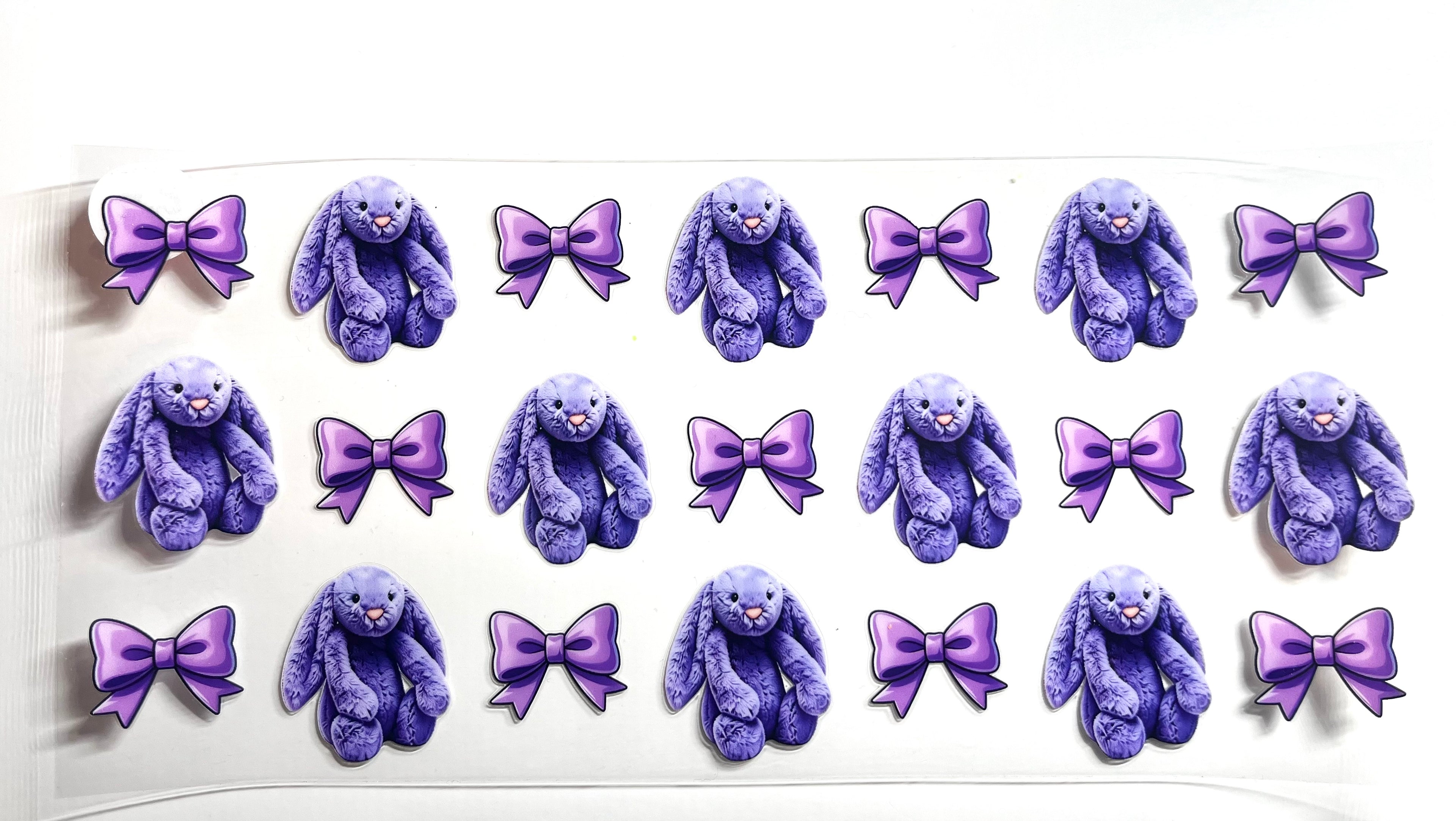 Purple plush bunny and satin bow decal in soft lavender tones coquette aesthetic