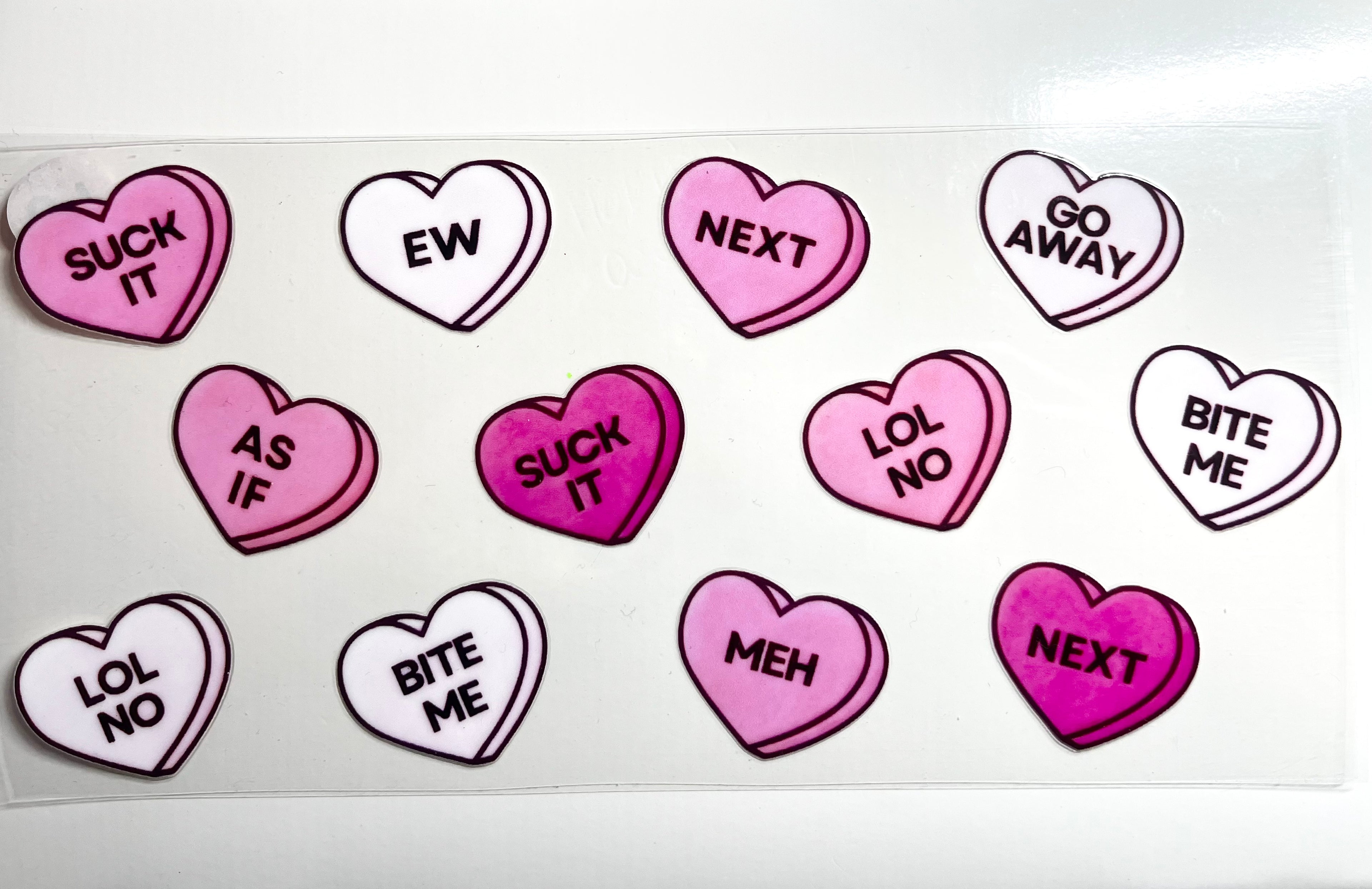 Sassy candy hearts decal with funny phrases EW NEXT GO AWAY LOL NO and BITE ME in pink and white