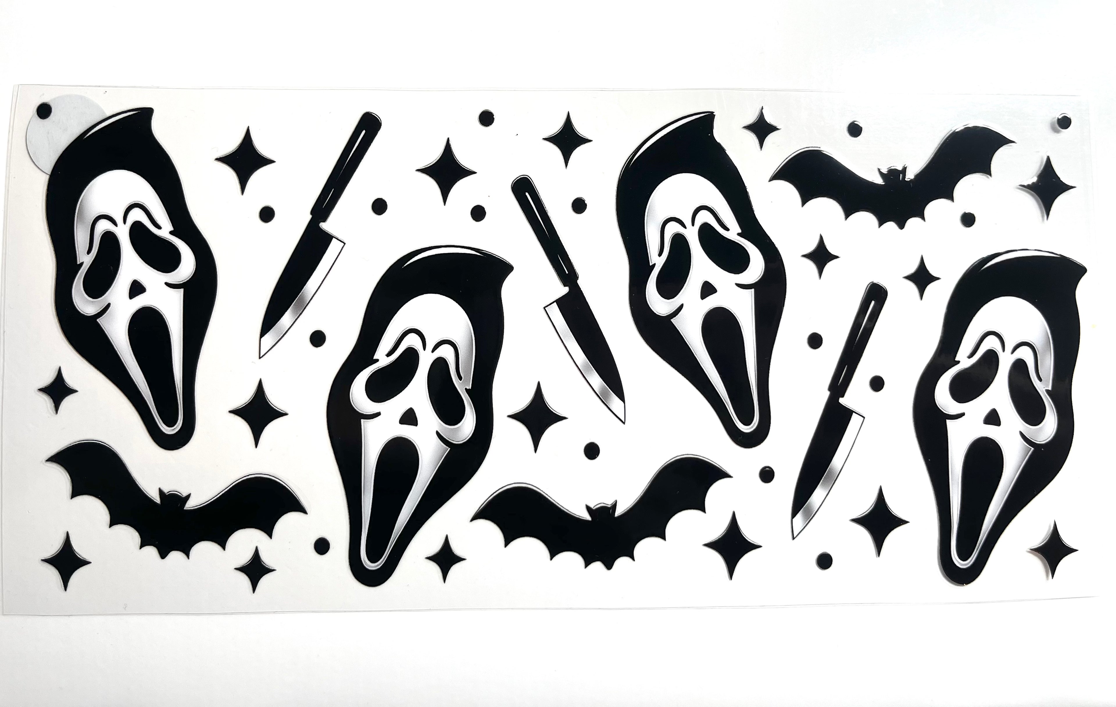 Spooky ghost mask and bats decal with knives and sparkle stars in bold black and white halloween horror aesthetic