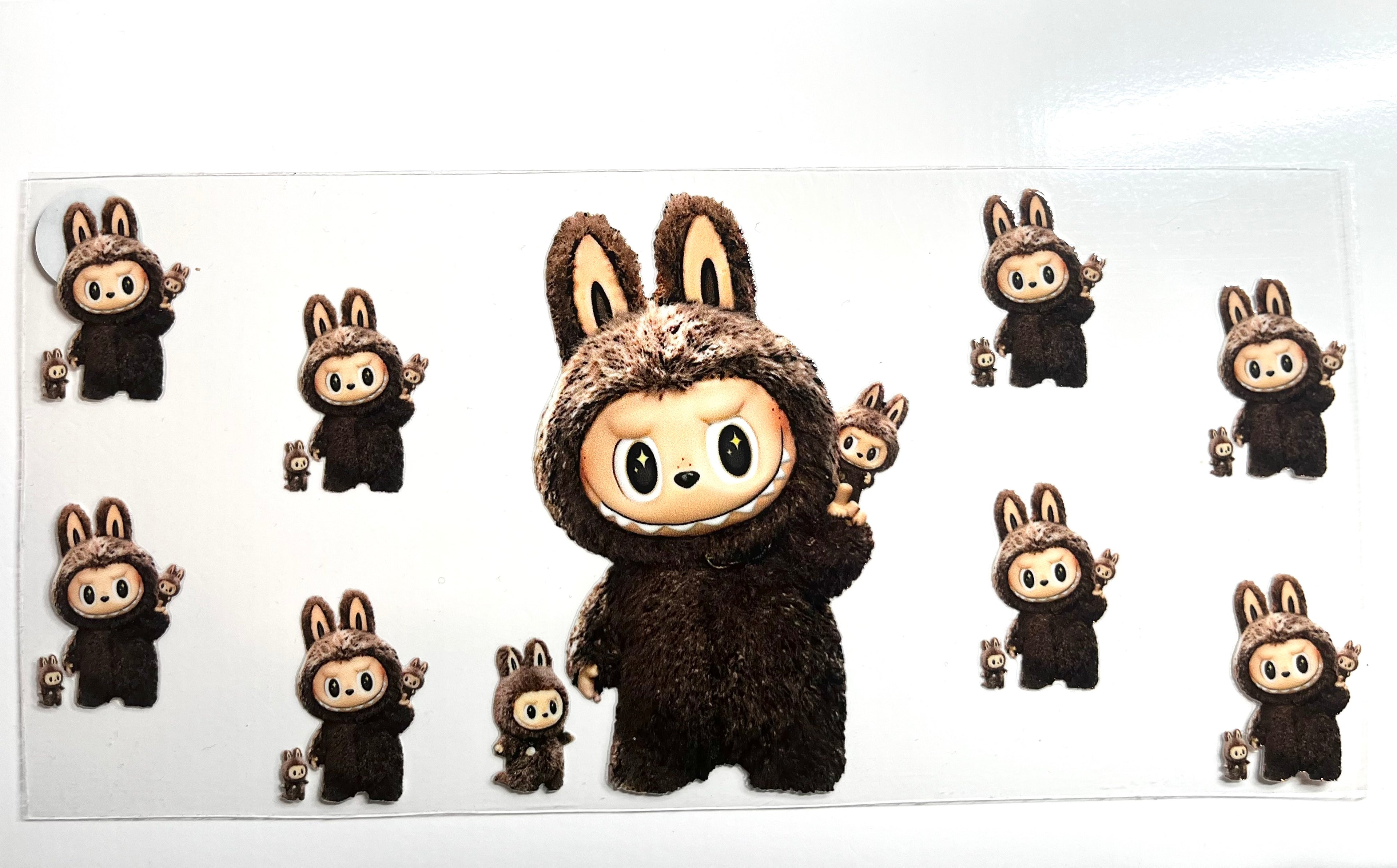 Fuzzy bunny suit creature decal with big sparkle eyes and mini friend cute dark art toy aesthetic