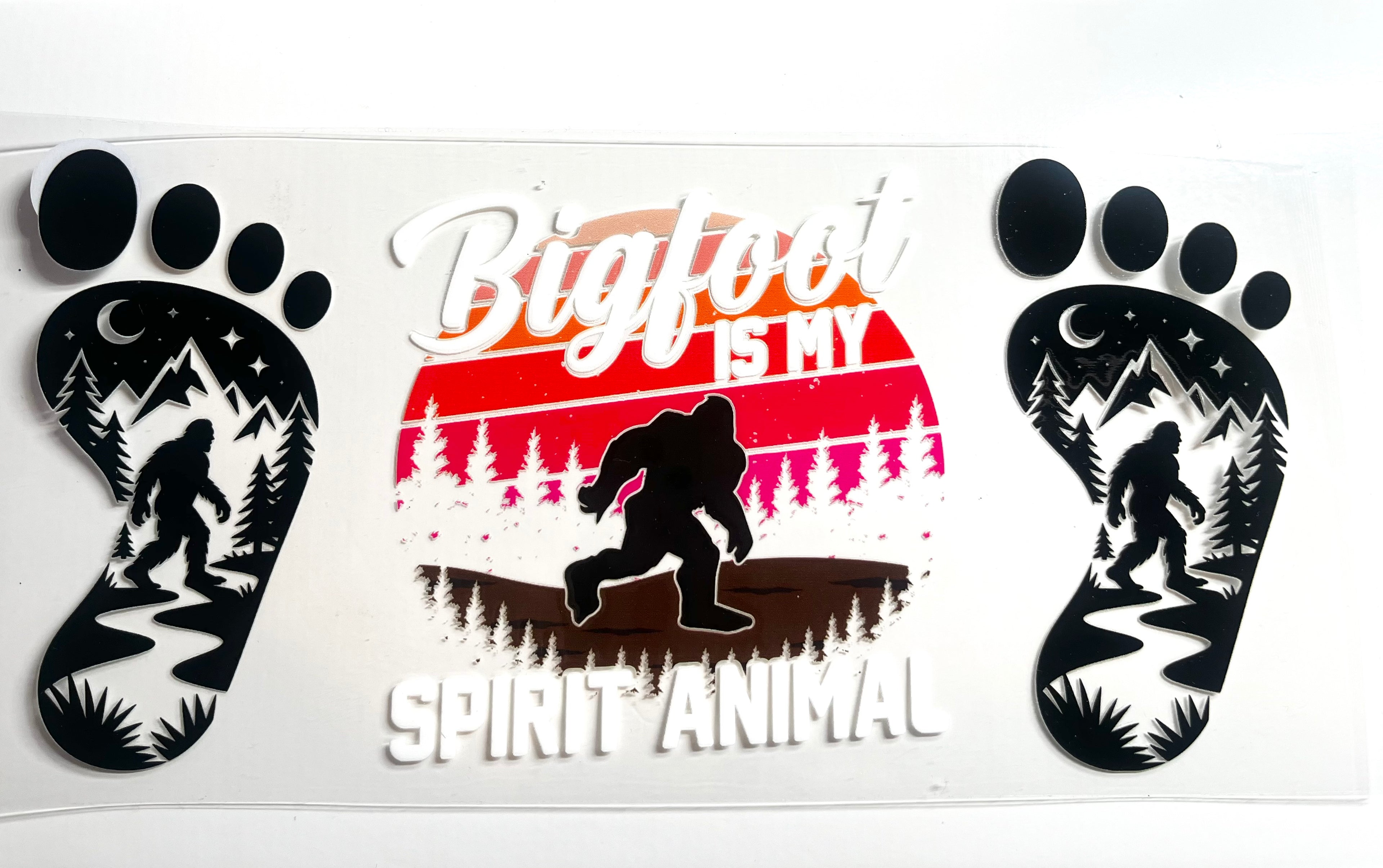 Bigfoot Is My Spirit Animal decal with footprint silhouettes and mountain forest scenes