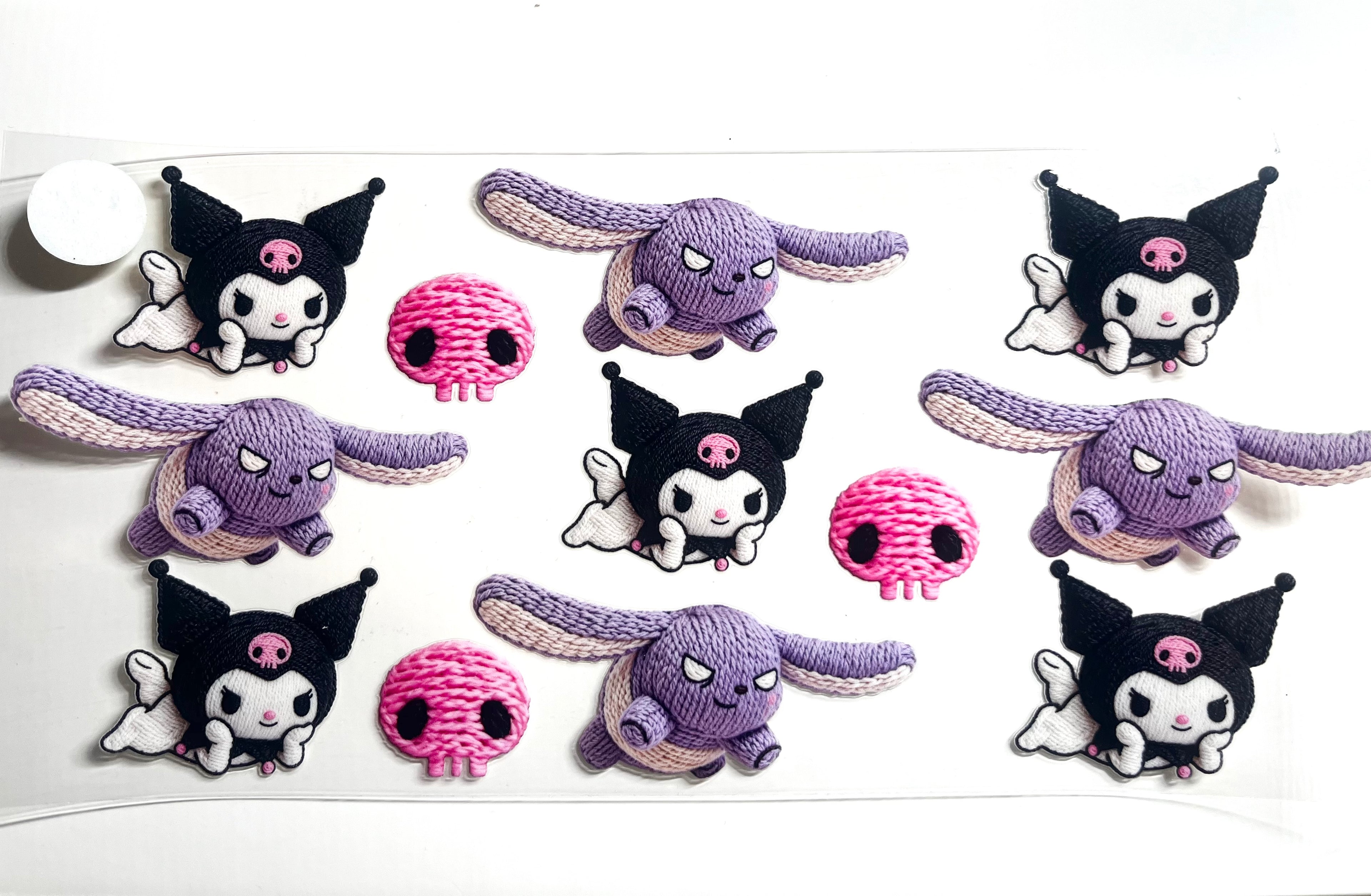 Kuromi crochet amigurumi style decal with purple and pink characters in multiple poses